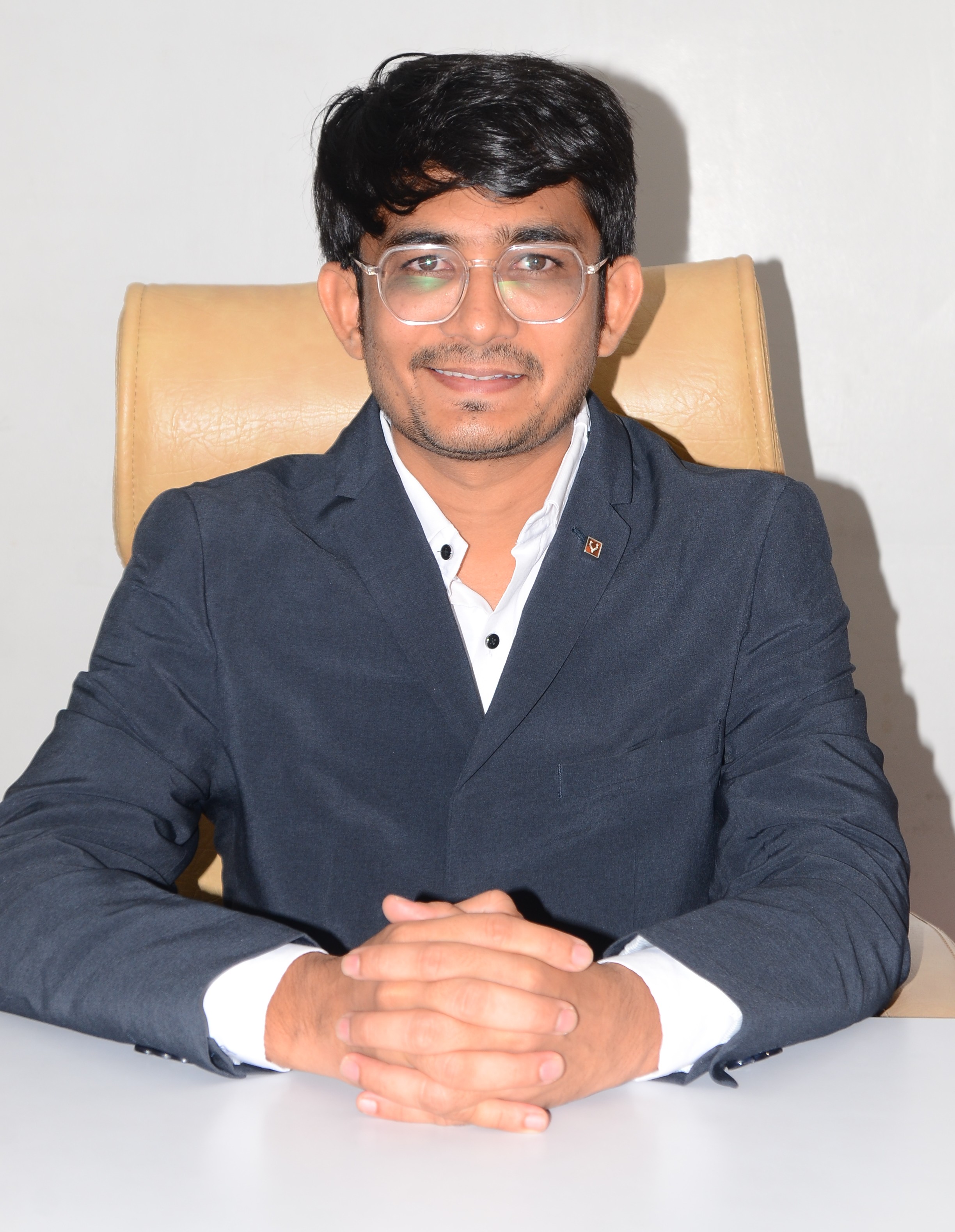 Dr. Dharmik Dhameliya